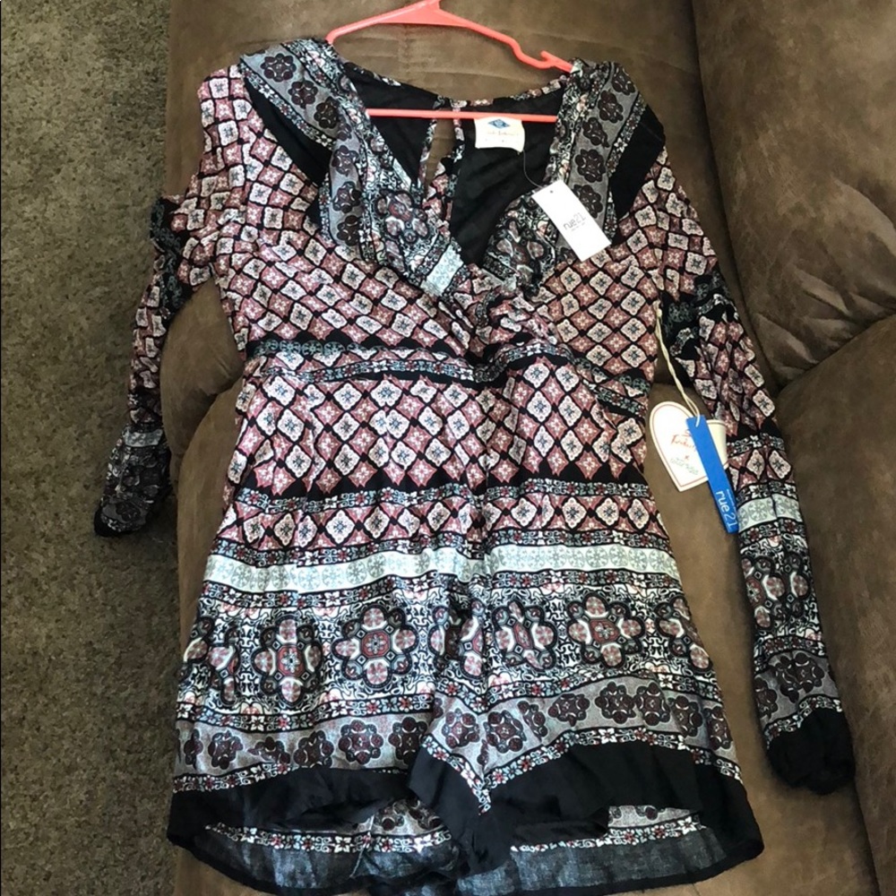 Multi colored romper. Rue 21 medium